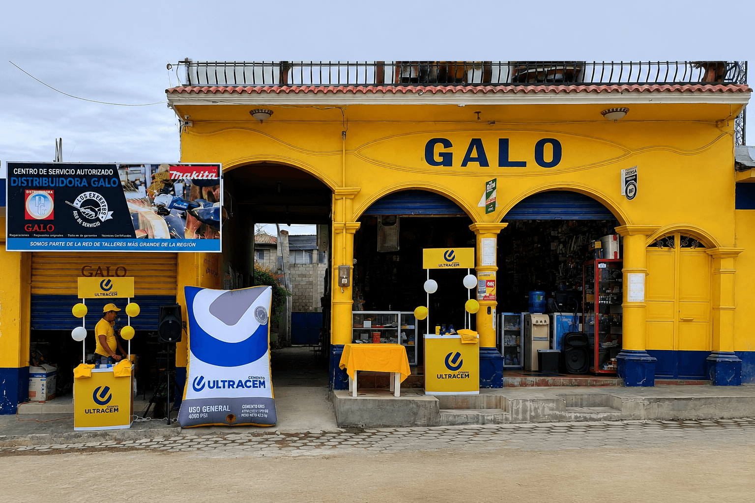 Fachada de Distribuidora Galo, Sucursal El Molino, con rótulo GALO, arcos y entrada principal